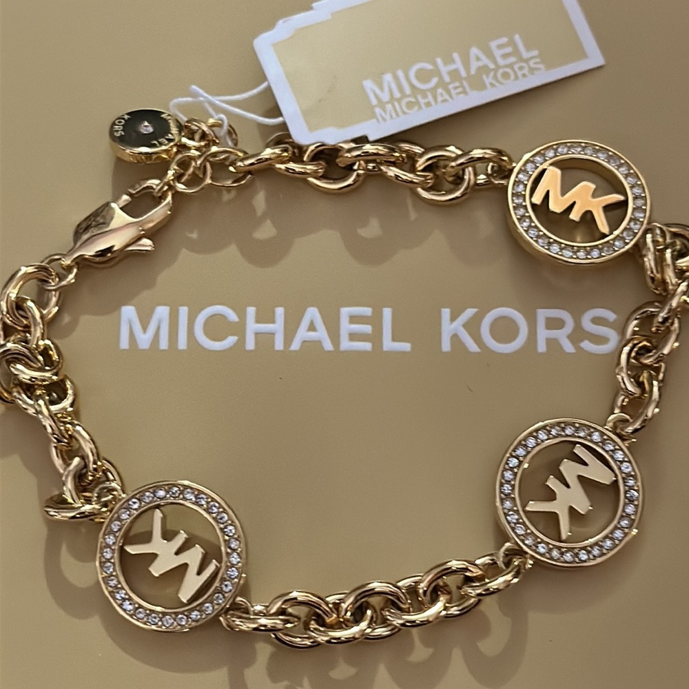 Michael Kors gold bracelet.